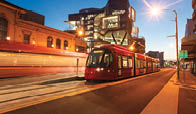 Newly installed light rail in Newcastle CBD Australia  Illuminated at dusk 